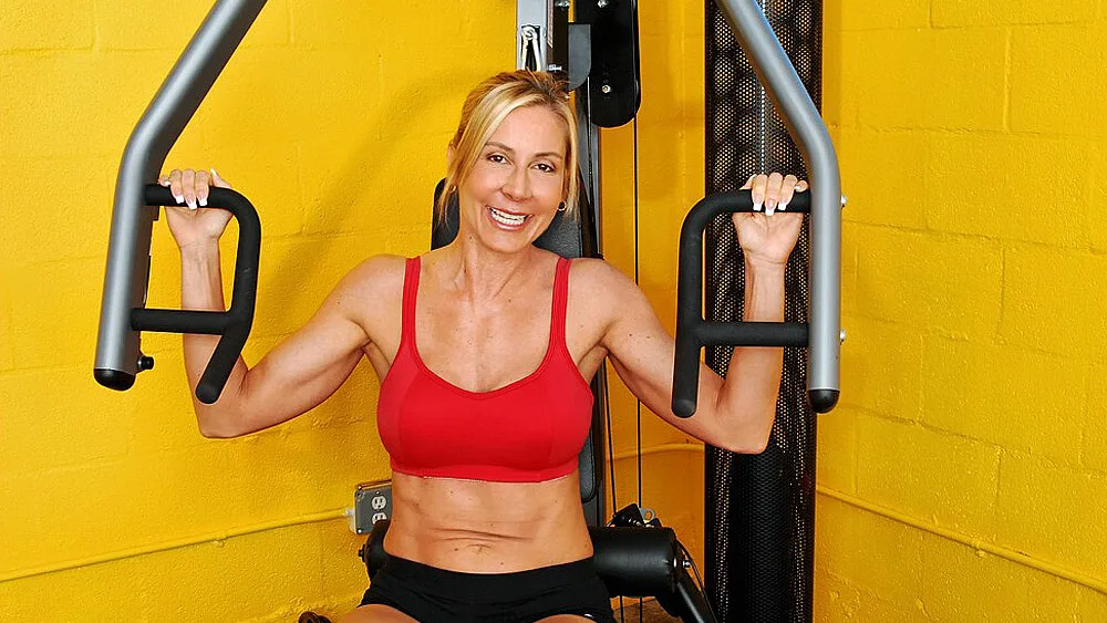 Blonde Kelly Estelle fucking in the gym with her tits - Dirt Cheap MILFs
